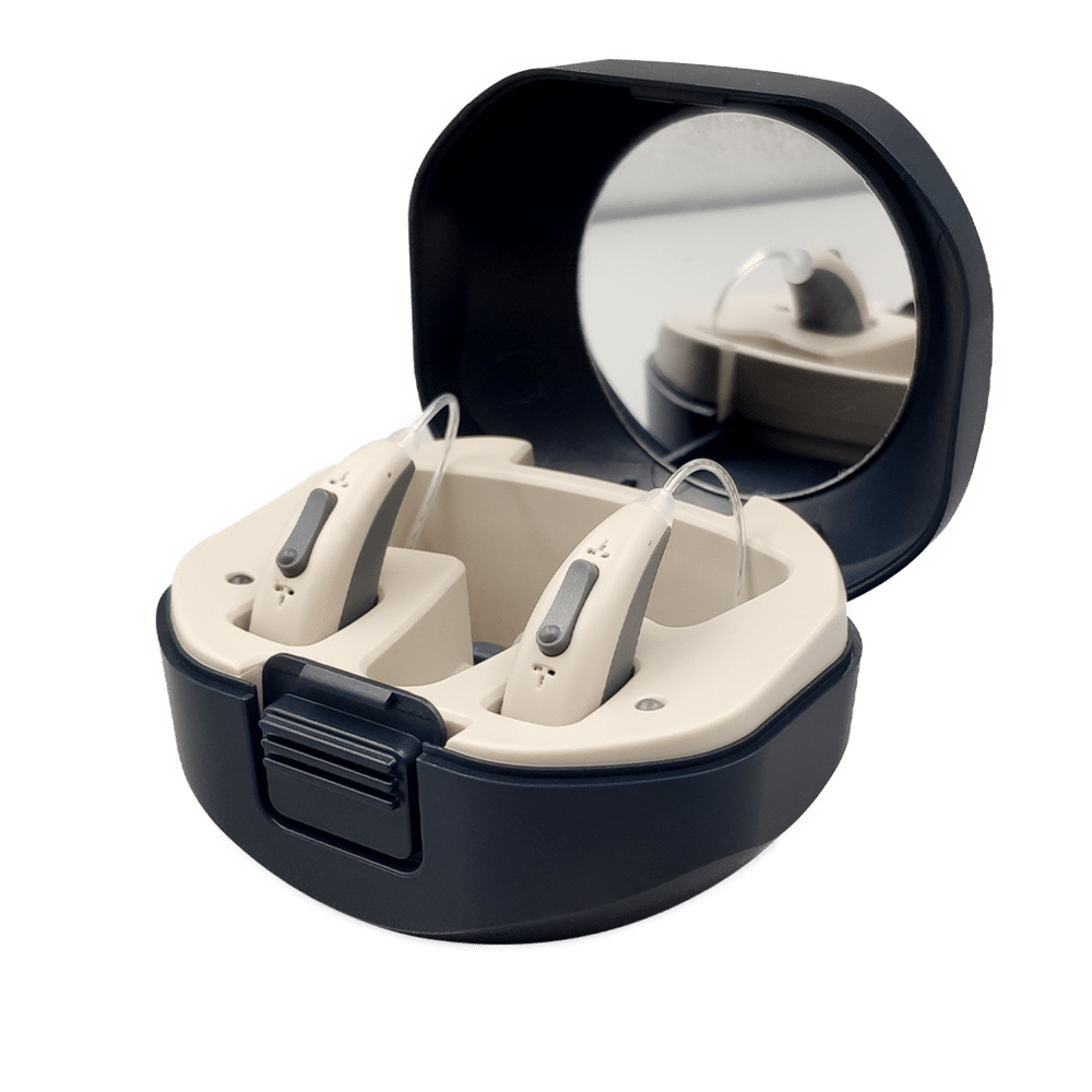 Set of hearing aids in charger box with mirror.